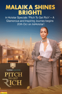 Mallika shines in Hotstar Specials’ “Pitch To Get Rich” promotional poster, wearing a stylish grey outfit with a modern city backdrop, highlighting the upcoming show premiering on October 20th on JioHotstar.
